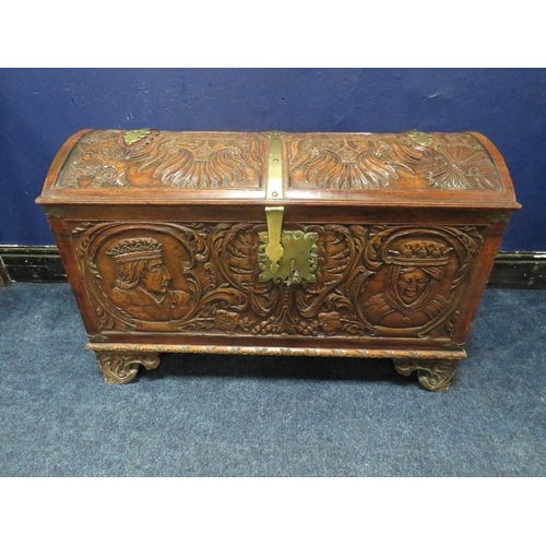 1156 - A DOMED 18TH CENTURY CARVED OAK COFFER WITH ORIGINAL KEY, the domed carved top with armorial detail,... 