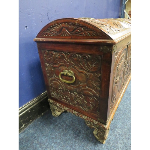 1156 - A DOMED 18TH CENTURY CARVED OAK COFFER WITH ORIGINAL KEY, the domed carved top with armorial detail,... 