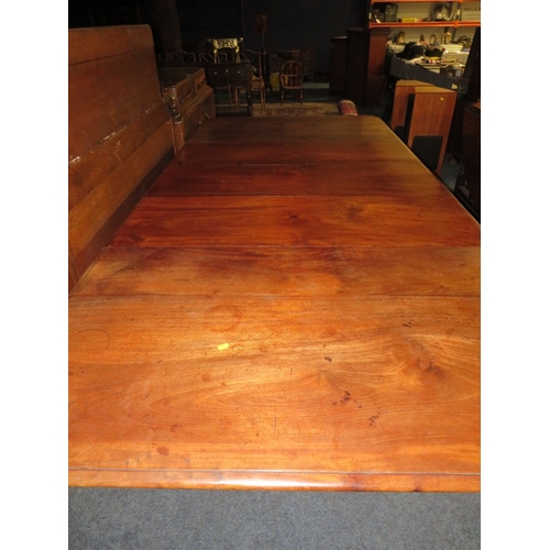 1159 - A MID-VICTORIAN MAHOGANY PULL-OUT EXTENDING DINING TABLE, having three additional leaves, raised on ... 