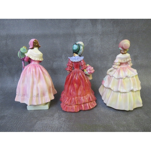 1009 - A ROYAL DOULTON 'THE NEW BONNET' FIGURINE HN1728, 'Lady Betty' figure HN1967 and 'Irene' figure HN16... 