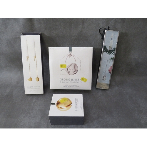 555 - GEORG JENSEN - A SELECTION OF CHRISTMAS COLLECTABLES, to include a set of acorn & wild bird candleho... 