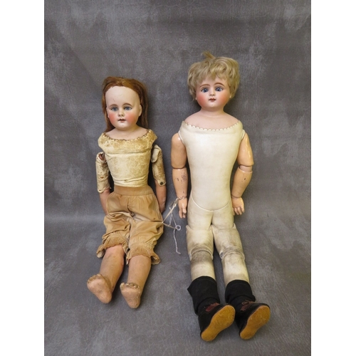 TWO LATE 18TH / 19TH CENTURY HIDE BODIED DOLLS, one marked 312 / 8, one in need of some restoration