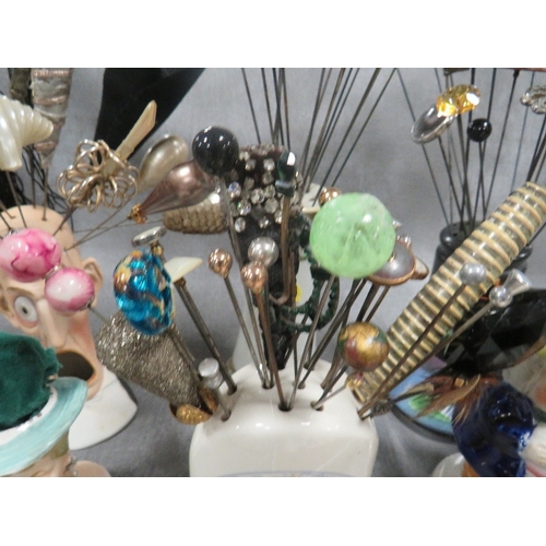 584 - AN EXTENSIVE COLLECTION OF VINTAGE HATPINS ETC., various styles, sizes and periods, to include Art D... 