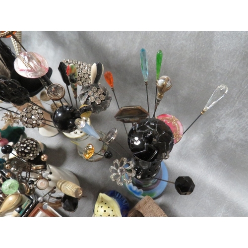 584 - AN EXTENSIVE COLLECTION OF VINTAGE HATPINS ETC., various styles, sizes and periods, to include Art D... 