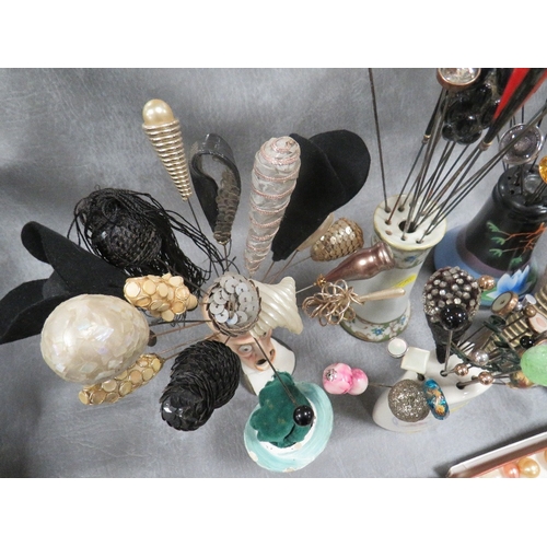 584 - AN EXTENSIVE COLLECTION OF VINTAGE HATPINS ETC., various styles, sizes and periods, to include Art D... 