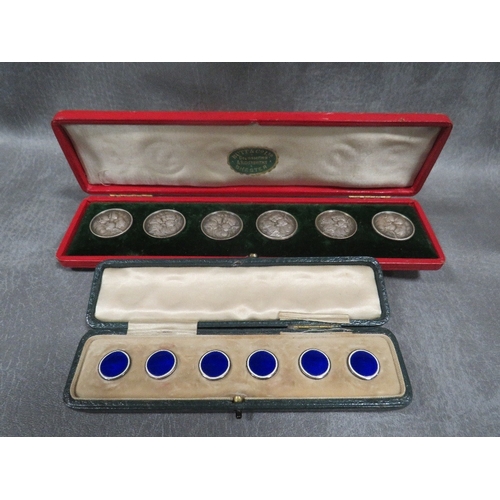 589 - A CASED SET OF SIX HALLMARKED SILVER AND ENAMEL BUTTONS - CHESTER 1912, together with a cased set of... 