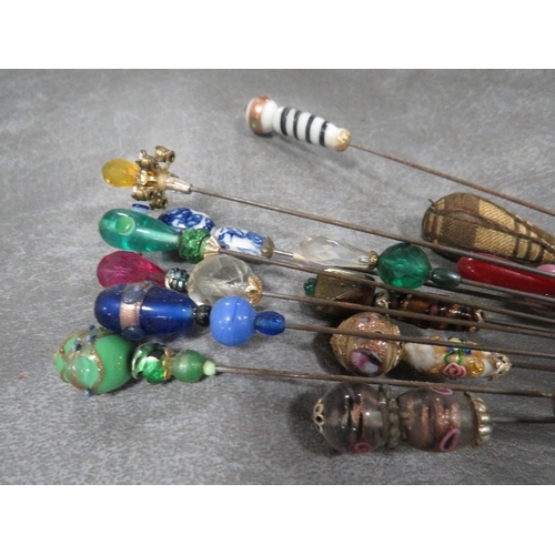 591 - A COLLECTION OF ASSORTED HATPINS, varying sizes, styles and periods, to include Art Deco Lucite hatp... 