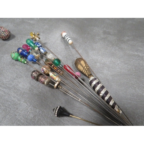 591 - A COLLECTION OF ASSORTED HATPINS, varying sizes, styles and periods, to include Art Deco Lucite hatp... 