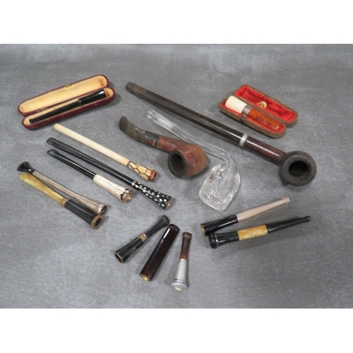 592 - A COLLECTION OF VINTAGE CHEROOT HOLDERS, to include two cased examples, one being amber with a hallm... 