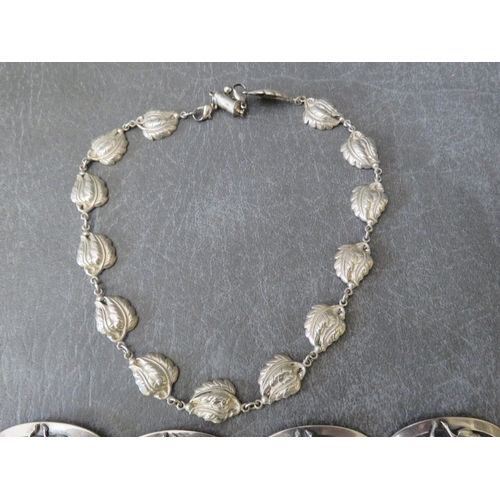 624 - A DANECRAFT STERLING SILVER PANEL LINK BRACELET, together with a Danecraft leaf design silver neckla... 