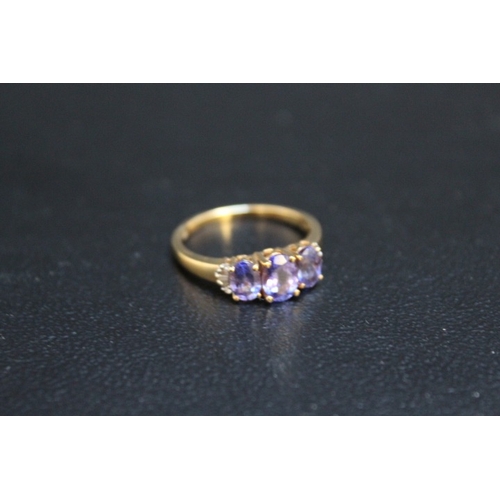 693 - AN ILLIANA 18CT GOLD GEMSET DRESS RING, size R, approx. weight 3.79 g