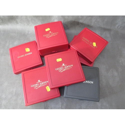 554 - GEORG JENSEN - A COLLECTION OF FIVE BOXED CHRISTMAS ORNAMENTS,  comprising 1998, 1994, two x 2004 an... 