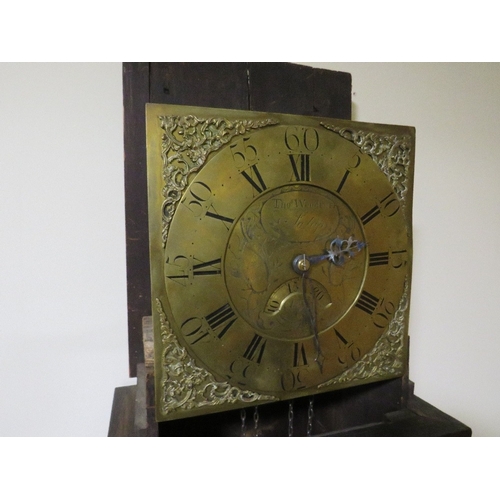 1147 - THOMAS WOODRUFF OF SALOP - A BRASS FACED CARVED OAK LONGCASE CLOCK, the face with date aperture and ... 