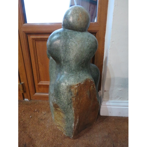 1185 - AN AFRICAN CARVED STONE SCULPTURE DEPICTING THREE FIGURES, H 75 cm