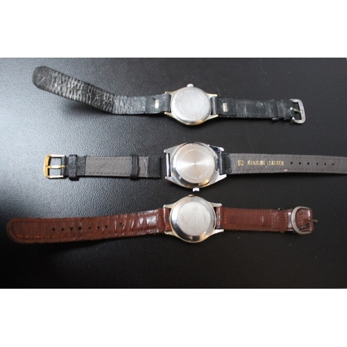 736 - TWO SERVICES WATCHES, one with black face, together with a Junghans watch, average Dia. 3 cm (3)