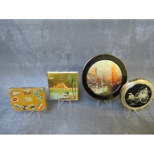 579 - FOUR ASSORTED TRAVEL THEMED VINTAGE POWDER COMPACTS, to include an Austrian 'Mode Depose' suitcase s... 