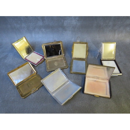 582 - A COLLECTION OF SEVEN ART DECO AND LATER VINTAGE POWDER COMPACTS ETC., to include rectangular compac... 