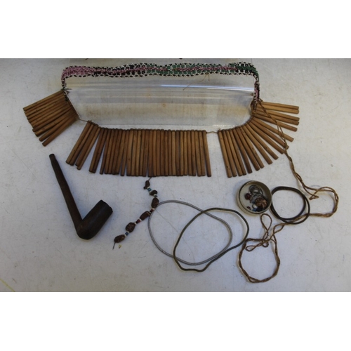 1051 - A COLLECTION OF SOUTH AFRICAN ZULU BEADWORK ITEMS, with a Xhosa nursing necklace, pipes, jewellery, ... 