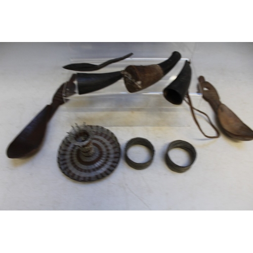 1052 - THREE EAST AFRICAN MASAI SNUFF HORNS, two Sudanese bone spoons, a Native American horn spoon and Sou... 