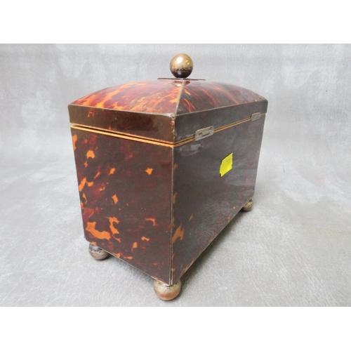 1101 - A GEORGE III BOW-FRONTED TORTOISESHELL TEA CADDY, raised on four bun feet, the hinged lid with circu... 