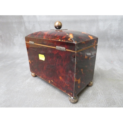 1101 - A GEORGE III BOW-FRONTED TORTOISESHELL TEA CADDY, raised on four bun feet, the hinged lid with circu... 