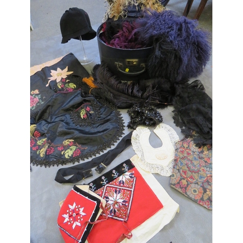 530 - A VINTAGE HAT BOX AND CONTENTS, together with a selection of vintage children's clothing items and a... 