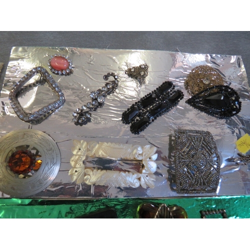 542 - A SMALL SELECTION OF VINTAGE BUCKLES AND CLIPS, to include jet, mother of pearl, diamante and Art De... 