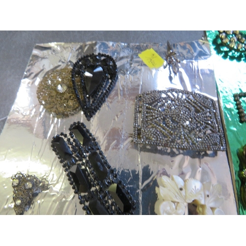 542 - A SMALL SELECTION OF VINTAGE BUCKLES AND CLIPS, to include jet, mother of pearl, diamante and Art De... 