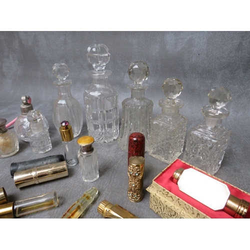 590 - COLLECTION OF EIGHT ASSORTED CUT GLASS VANITY JARS, together with four small perfume bottles, to inc... 