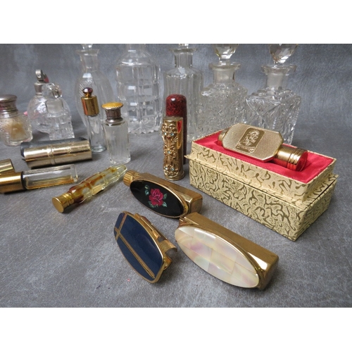 590 - COLLECTION OF EIGHT ASSORTED CUT GLASS VANITY JARS, together with four small perfume bottles, to inc... 