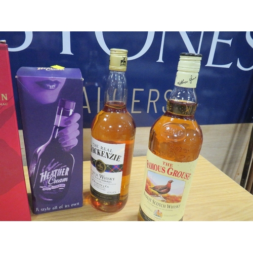 899 - 5 ASSORTED BOTTLES OF WHISKY, cognac etc consisting of 1 boxed bottle of Remy Martin VSOP cognac. 1 ... 