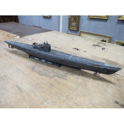 361 - Three plastic models to include a Ford Popular diorama, a large German U-boat and a knight with hors... 