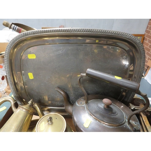 90 - A large cast iron cooking pot together with a tray of metal ware (2)