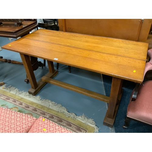 789 - An oak trestle style table W 152 cm