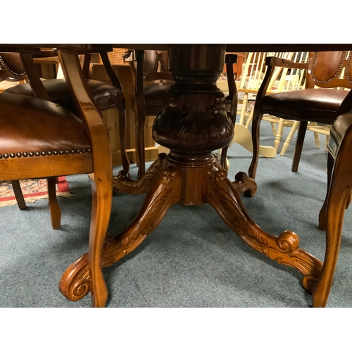 792 - A large reproduction Italian style circular pedestal table with lazy susan and six chairs