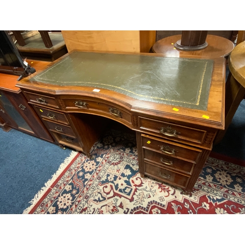 796 - An Edwardian twin pedestal leather topped desk W 125 cm