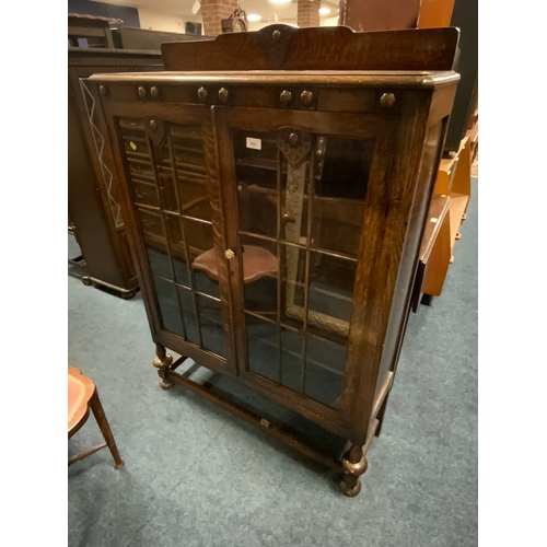 802 - A oak glazed two door bookcase W 93 cm