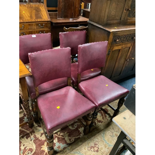 823 - A set of four oak framed dining chairs