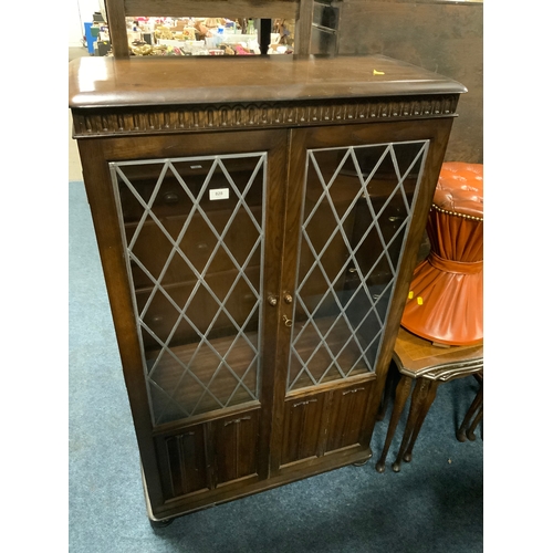 828 - An oak glazed bookcase W 79 cm