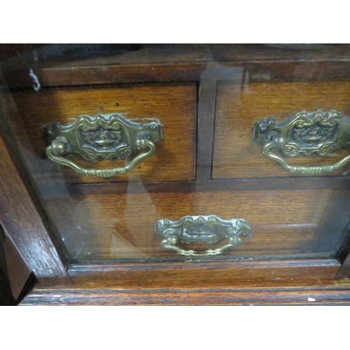 284 - A mahogany smokers cabinet together with an oriental box