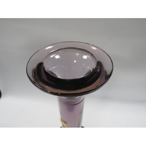 328 - An oversized aubergine coloured studio glass candlestick