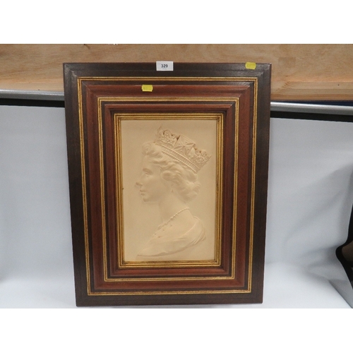 329 - A framed Royal Worcester ceramic portrait of The Queen by Arnold Machin dated 1976