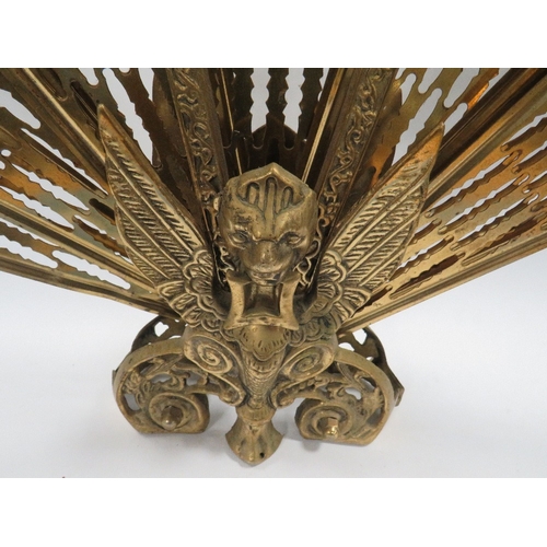 330 - A vintage brass peacock firescreen