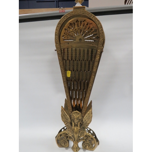 330 - A vintage brass peacock firescreen