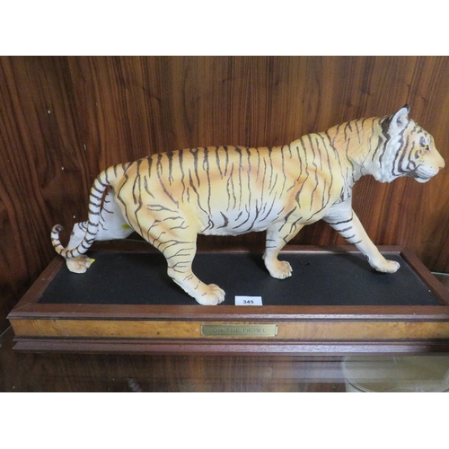 345 - A Franklin Mint tiger on stand 