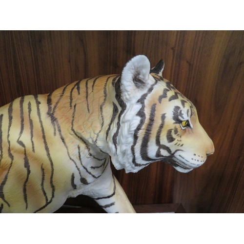 345 - A Franklin Mint tiger on stand 