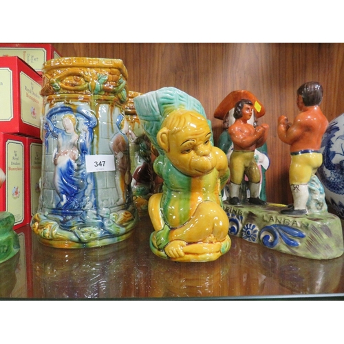 347 - A selection of reproduction majolica and Staffordshire style figures