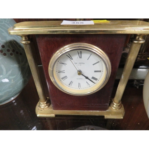 355 - Three collectible clocks to include a retro Russian ball clock, a heavy brass William Widdop mantle ... 