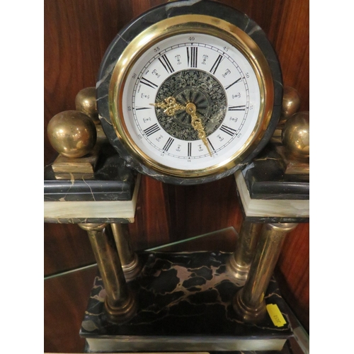 355 - Three collectible clocks to include a retro Russian ball clock, a heavy brass William Widdop mantle ... 