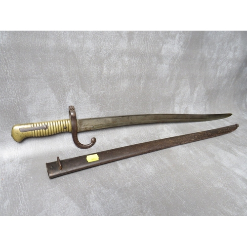 8 - A FRENCH 19TH CENTURY CHASSPOT BAYONET, with brass grip, in steel scabbard, L 71 cm